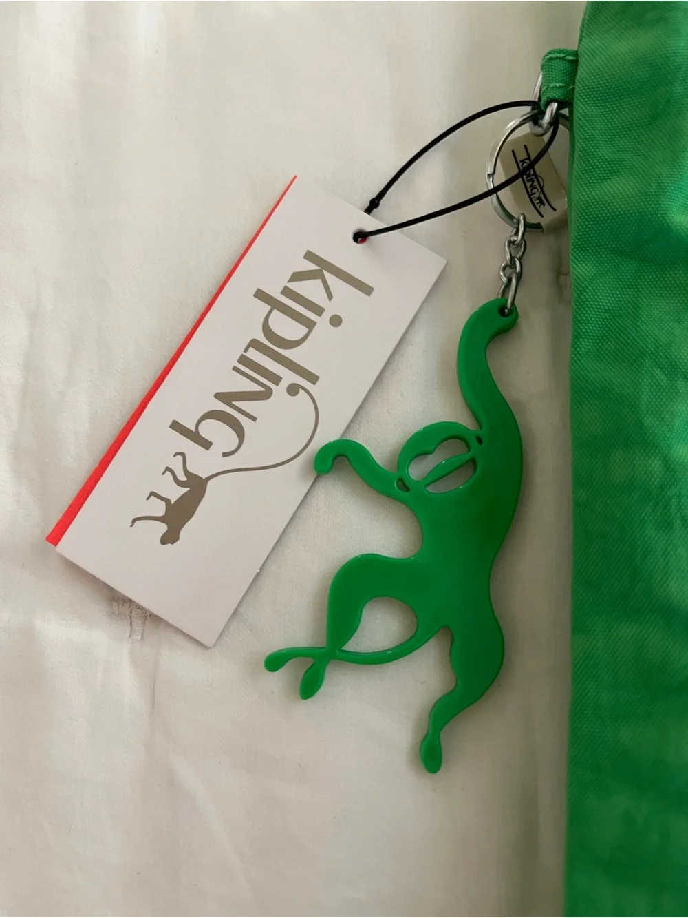 Kipling Reversible Bright Green Bag with Monkey Charm Keyring